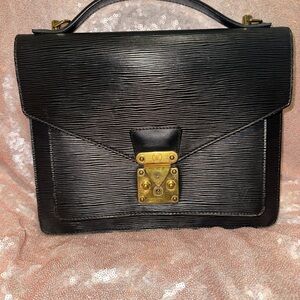 Louis Vuitton Black Textured Travel Bag with Gold Accents